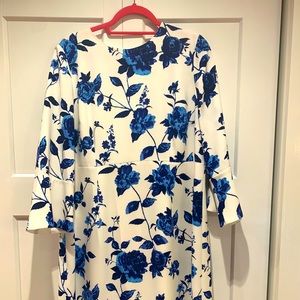 Never worn pretty floral print dress in blue and white with price  tag in place.